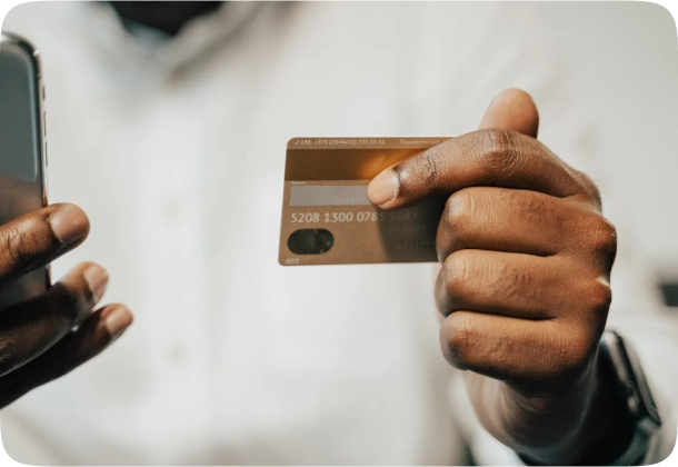 man holding atm card